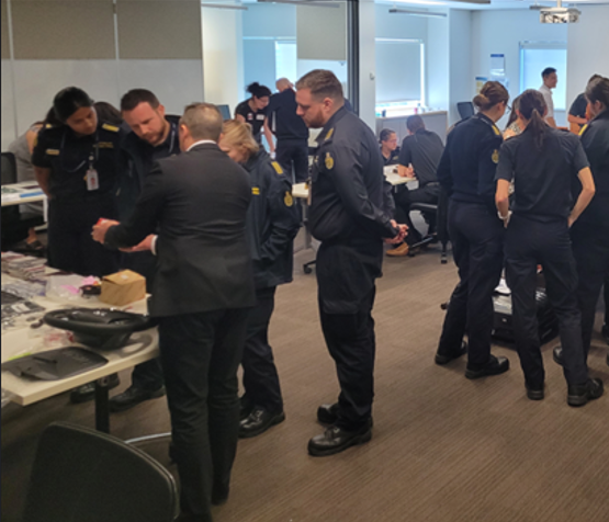 ABF officers inspecting automobile parts in an IP Enforcement workshop hosted by the ABF (image supplied by the ABF)